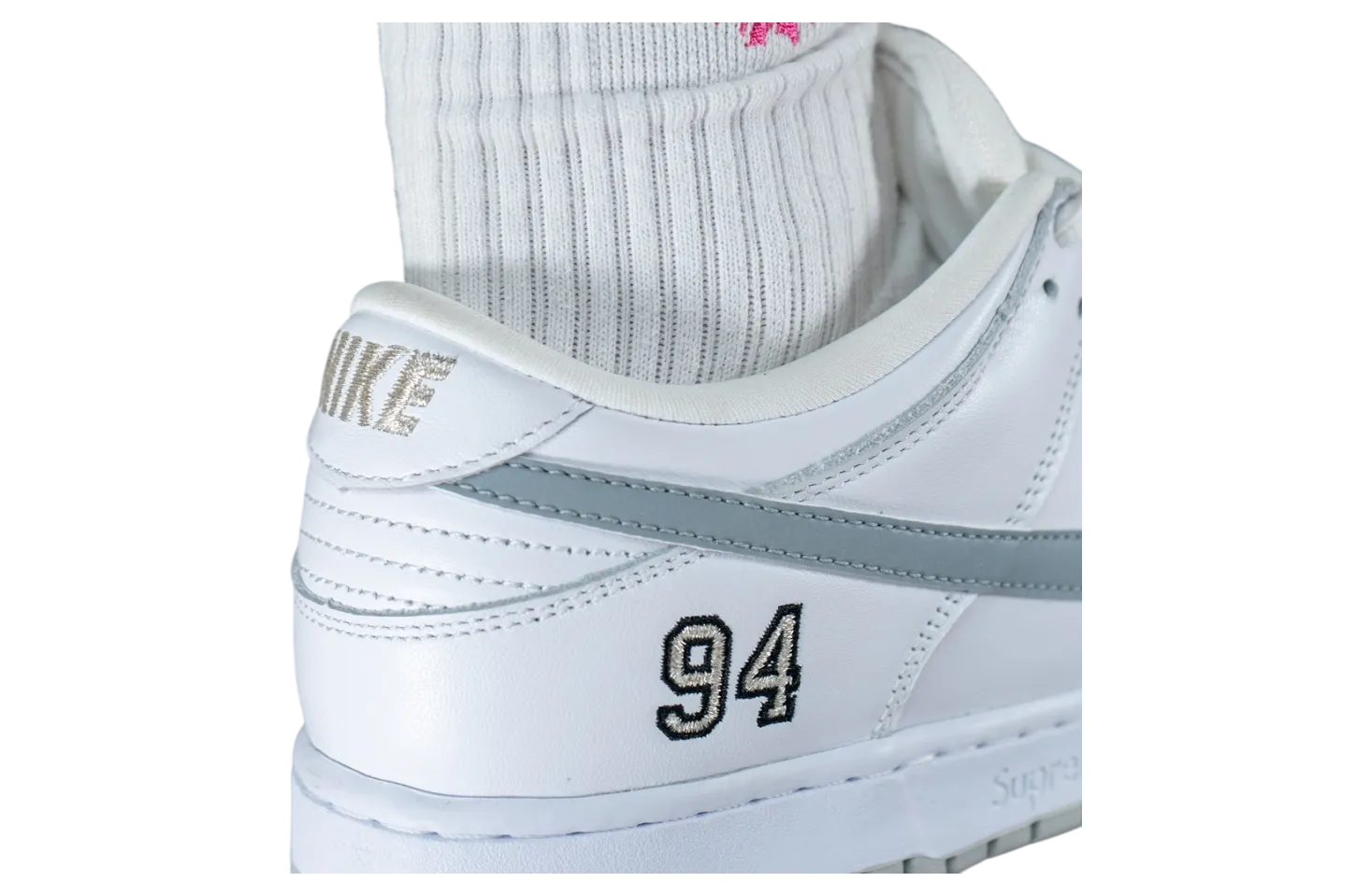 supreme x nike sb dunk low white metallic silver white 12