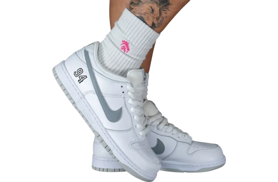 supreme x nike sb dunk low white metallic silver white 2