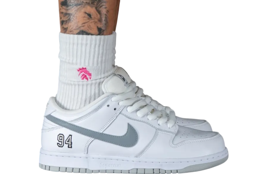supreme x nike sb dunk low white metallic silver white